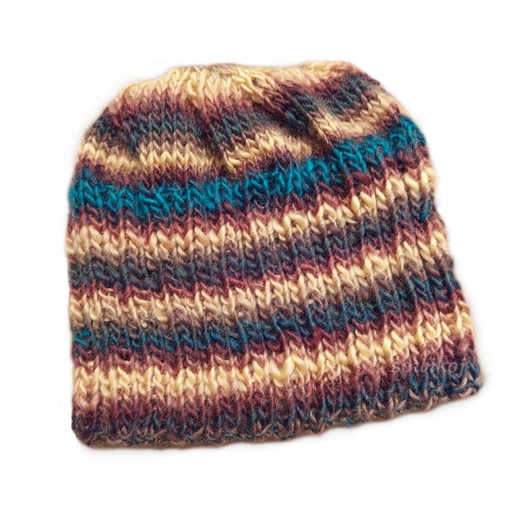 Przykładowa realizacja z włóczki ambiance - czapka na drutach - niecałe pół motka.