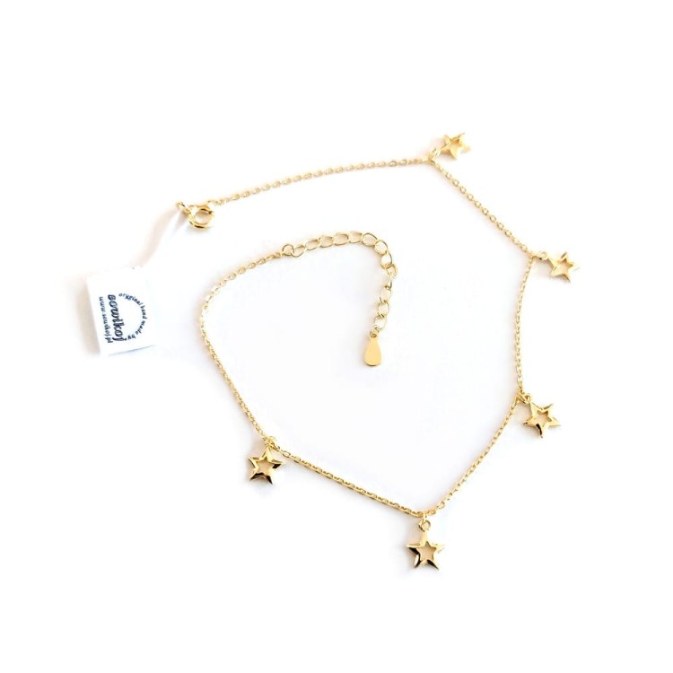 Srebrna pozłacana bransoletka na kostkę z przywieszkami - gwiazdka