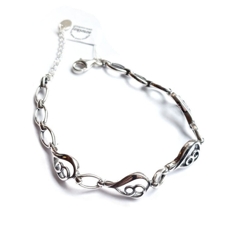 szeroka bransoletka srebrna z fantazyjnych elementów